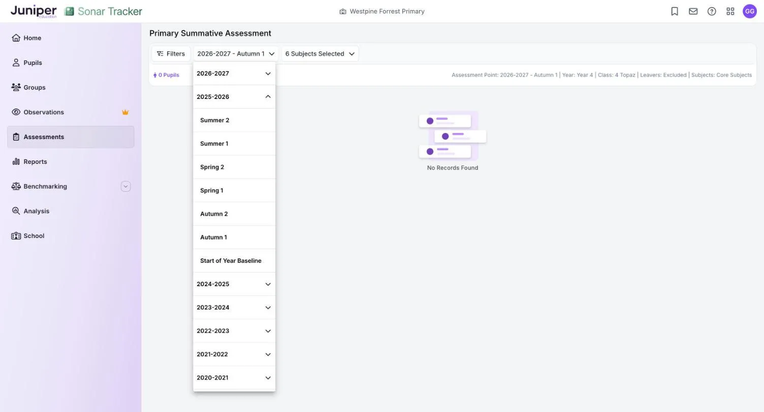 The assessment point list open on the Primary Summative Assessment page. Academic years are listed from 2026-2027 down to 2020-2021, and 2025-2026 is expanded to show Summer 2, Summer 1, Spring 2, Spring 1, Autumn 2, Autumn 1 and Start of Year Baseline.